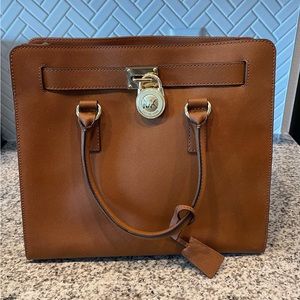 Micheal Kors purse. Lock and key